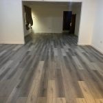 Grey wood-look SPC flooring in Arabian Ranches living area
