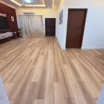 Natural wood-look SPC flooring in Emirates Hills villa