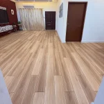 SPC flooring installation across Emirates Hills living room