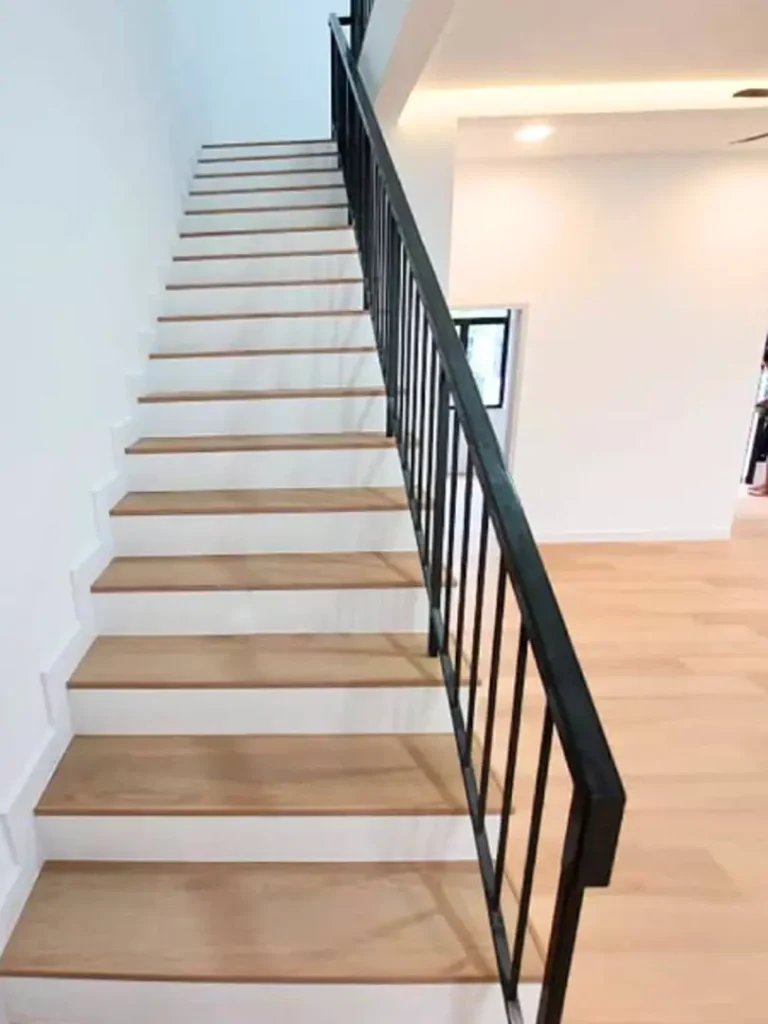 spc flooring install stair case and living room